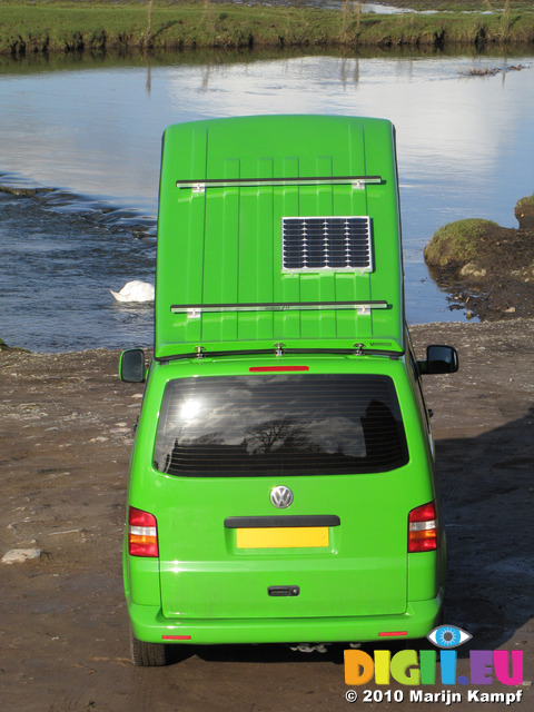 SX12393 Our green VW T5 campervan with popup roof at Ogmore Castle